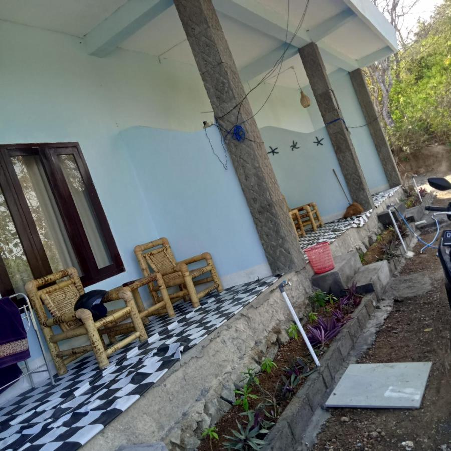 Sunrise Bukit Asam Homestay Kuta  ภายนอก รูปภาพ