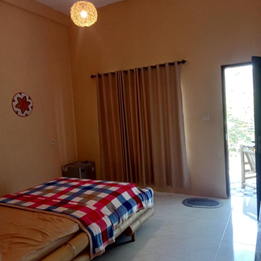 Sunrise Bukit Asam Homestay Kuta  ภายนอก รูปภาพ