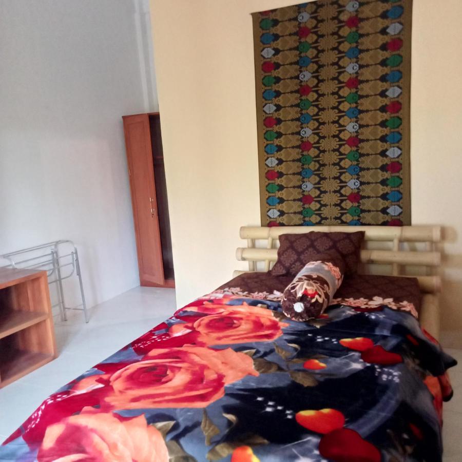 Sunrise Bukit Asam Homestay Kuta  ภายนอก รูปภาพ